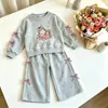 Conjunto de Sudadera de Dibujos Animados para Niñas 2026 Primavera Nuevo de Moda Lindo Sudadera con Lazo y Pantalones Deportivos Conjunto Casual de Dos Piezas