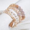 Pulseira feminina de linha elástica transfronteiriça europeia e americana com contas multicamadas, conjunto de pulseiras vintage com pingente de borla boêmia para mulheres