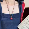 Collar trenzado de cachorro de dibujos animados de color dopamina para mujer, cadena colgante decorativa larga para cuello halter, accesorios