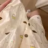 Pijama de estilo japonés dulce con estampado completo de conejos y ribete de encaje, conjunto de dos piezas de cárdigan de manga corta y shorts para el verano, ropa de estar