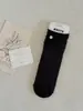 26 Calcetines Nuevos de Primavera Estilo Coreano Borde Enrollado Abotonados Calcetines de Media Pantorrilla para Mujer Versátiles Estilo Miu Puño Suelto Calcetines Arrugados Sin Costuras