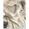 Lujo Ligero Calado Bloque de Color Moda Tejido Verano 2026 Nuevo Estilo Exquisito Chic Estilo Casual Reductor de Edad Top de Manga Corta