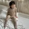 Conjunto de Roupa de Casa Sem Costura de Algodão Puro com Lycra Outono/Inverno 2026 para Crianças Meninos Meninas Bebê Blusa de Outono Calças de Outono Conjunto de Pijama