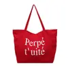 Bolso tote de tela casual y moderno estilo coreano, bolso de mano de moda con estampado de letras, uso a doble cara, bolso de hombro a rayas para mujer