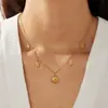 Collar con colgante de concha y estrella de mar estilo oceánico, popular en comercio exterior, cadena versátil de acero inoxidable chapado en oro para mujer, cadena para la clavícula de verano