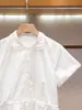Shenzhen Nanyou ropa de mujer de alta gama verano nuevo estilo juvenil y moderno con cordón en la cintura para adelgazar vestido de manga corta para mujer