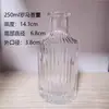 Botella de Aromaterapia Columna Romana de 100 ml al por mayor Botella de Vidrio con Raya Vertical Tarjeta de Material Blanco Fino Aromaterapia de Vidrio Romano