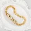 Distrito de Lu Cruzamento Novo Cobre Incrustado Zircônia Criativo Duas Cabeças Leopardo Pingente Conserva de Cor Ouro Genuíno Galvanizado Personalizado Hip-hop Pulseira