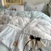 Juego de ropa de cama romántico de invierno estilo francés, que incluye un juego de cuatro piezas con sábanas de terciopelo de leche gruesas, cálidas y suaves, y forro polar de coral para mayor comodidad.