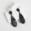 Pendientes Amazon transfronterizos, extragrandes, electrochapados, elegantes, de estilo largo, con un toque de alta gama, adornados con borlas y pedrería negra