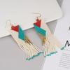 Pendientes de cuentas de arroz de colores transfronterizos europeos y americanos, estilo étnico nicho, joyería hecha a mano, pendientes de borlas bohemios personalizados