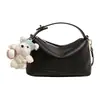 Bolso de mano de alta costura estilo coreano, bolso de hombro, nuevo modelo primavera 2026, bolso tipo almohada casual simple, bolso cruzado de nicho para mujer