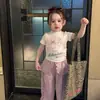 Conjunto de verano nuevo estilo coreano para niñas 2026, camiseta linda para bebés, top versátil, pantalones de pierna ancha con dobladillo de volantes a la moda