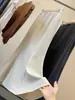 Saia de terno simples estilo sereia para mulheres, novo estilo outono, cintura alta, fluida, que cobre o quadril, elegante, justa ao corpo, saia de comprimento médio para o trabalho