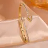 RAKOL Moda Luxo Leve Cobre Incrustado Zircônia Trevo de Quatro Folhas Aberto Ajustável Pulseira Feminina Nicho Toque de Alto Padrão Joia de Mão