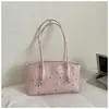 Bolsas Estampadas de Nicho Primavera e Verão para Mulheres 2026 Nova Chegada Bolsa de Ombro Único Estilosa para o Trabalho Bolsa de Mão Baguete Fashion