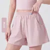 Roupas de Yoga Moda Feminina Versátil Bolso Plissado Shorts Anti-exposição Cintura Elástica Forro Anti-exposição Esportes Sem Exposição