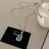 Collar de acero de titanio con cadena para clavícula femenina, imitación de calcedonia de hielo alta natural, Buda, accesorios de regalo de cumpleaños avanzados, venta al por mayor en vivo