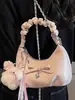 Bolsa Pequena Plissada com Laço Estilo Novo Primavera 2026 Bolsa de Mão Feminina Retrô Bolsa Nuvem Bolsa Transversal com Corrente Bolsa de Trabalho