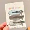 Pinza para el pelo azul de lunares con lazo estilo coreano para mujer, nuevo modelo 2026, pinza lateral para flequillo y mechones, accesorio para el cabello