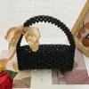 Moda de Verano Elegante Retro Bolso Tejido Nuevo Versátil Moderno Satchel con Lazo Estéreo y Cinta Bolso de Perlas