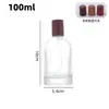 Al por mayor en stock 30/50/100ml botellas de perfume de vidrio transparente con spray de presión, botellas dispensadoras cosméticas portátiles