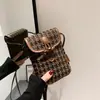 Bolsos populares para mujer este año 2026 otoño e invierno nuevo de moda bolso de teléfono a cuadros de un solo hombro diseño de nicho bolso cruzado