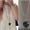 Collar con colgante de corazón y lunares de cadena larga diseño estilo coreano personalizado lujo ligero gama alta versátil estilo ins para mujer