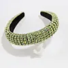Diadema ancha de pedrería europea y americana