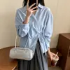 Comercio exterior transfronterizo AliExpress primavera y otoño encaje francés empalmado cuello en V corbata diagonal cintura irregular fruncida camisa de manga larga