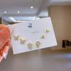 Pendientes de una semana de pequeño lujo de alta gama, juego de seis piezas con aguja de plata S925, combinación con pendientes pequeños para mujer