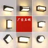 Lámpara de pared Jin Ximei estilo concha retro, diseñada para dormitorios, con una estética moderna de mediados de siglo, diseño simple, adecuada para estudios, lectura junto a la cama y tela tapizada