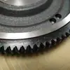 El volante FAW Jiefang BA00067-1005120-454-3050 viene con conjunto de corona dentada