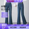 Jeans acampanados de cintura elástica hechos a medida para mujer, nuevo modelo primavera/otoño 2026, de tiro alto, elásticos, con costuras de contraste, versátiles
