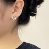 Pendientes de plata S925 con diseño avanzado de nicho, con estrellas encantadoras incrustadas en diamantes de Corea del Sur, con luz y temperamento de lujo