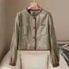 Ropa de pequeña cantidad 2026 Primavera/Otoño Nueva Chaqueta Abrigo de Cuero PU para Mujer Cuello Redondo Petite Corta Casual Estilo Coreano Top