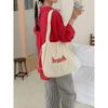 Bolso de mano con estampado de letras, bolso de hombro artístico para vacaciones y ocio, bolso de compras de gran capacidad, bolso con cordón, transfronterizo