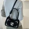 Bolsa de mão vintage requintada Ruien para mulheres, nova coleção de outono 2026, bolsa transversal estilosa com alto apelo estético, bolsa tote pequena da moda