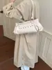 Bolso de Mano de Cuero Suave Color Sólido Lujo Ligero para Mujer 2026 Nuevo de Gama Alta para el Trabajo Transfronterizo Simple Moda Bolso de Hombro Único para el Trabajo