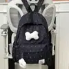 Mochila fresca y sencilla de lunares con lazo para mujer, nuevo modelo 2026, mochila versátil de gran capacidad para estudiantes de secundaria y preparatoria