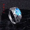 Anel de granada com folheado cruzado masculino e feminino ins alta moda comércio exterior anel de pedra preciosa tansan vermelho e azul ajuste de boca viva