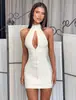 Vestido bandage de estilo europeo y americano con escote halter en V profunda y cremallera hueca, vestido corto bodycon ajustado, vestido de fiesta, venta al por mayor para comercio exterior