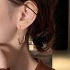 Venta caliente transfronteriza entre Europa y Estados Unidos, pendientes de cobre ovalados en forma de U de temperamento simple, pendientes de personalidad retro de alta gama para damas, al por mayor