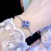 Pulsera de diamantes de trébol de alta calidad para niñas, estilo frío, diseño de nicho, exquisito collar de circonita azul marino con diamantes de lujo ligeros