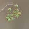 Pendientes de borla de flor de cuentas de color dopamina para primavera, sensación de lujo ligero y alta gama, pendientes atmosféricos estilo vacacional para mujer