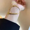 Pulsera de acero de titanio para tirar del codo estilo coreano moda ins letra dorada pulsera de moda de verano todo partido temperamento