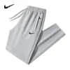 Pantalones Deportivos Casuales Nuevos de Primavera y Otoño para Hombre, Joggers Rectos Holgados, Marca de Moda, Talla Grande, Pantalones de Chándal de Algodón Puro Grises para Hombre