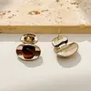 Brincos elegantes de pedra olho de tigre oval com design único, brincos de moda vintage e requintados para mulheres, adequados para uso diário