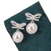 Brincos de Luxo com Laço Cravejado de Diamantes e Pérolas, Novo Estilo, Design de Nicho, Simples, Exquisitos, Modernos, Versáteis e de Alta Qualidade