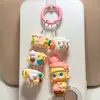 Serie de Helados Bubble Mart: Cuatro Cuentas Gruesas Pintadas al Óleo con Cierres de Lazo, Dijes para Teléfono, Cadenas para Teléfono y Dijes para Bolsos